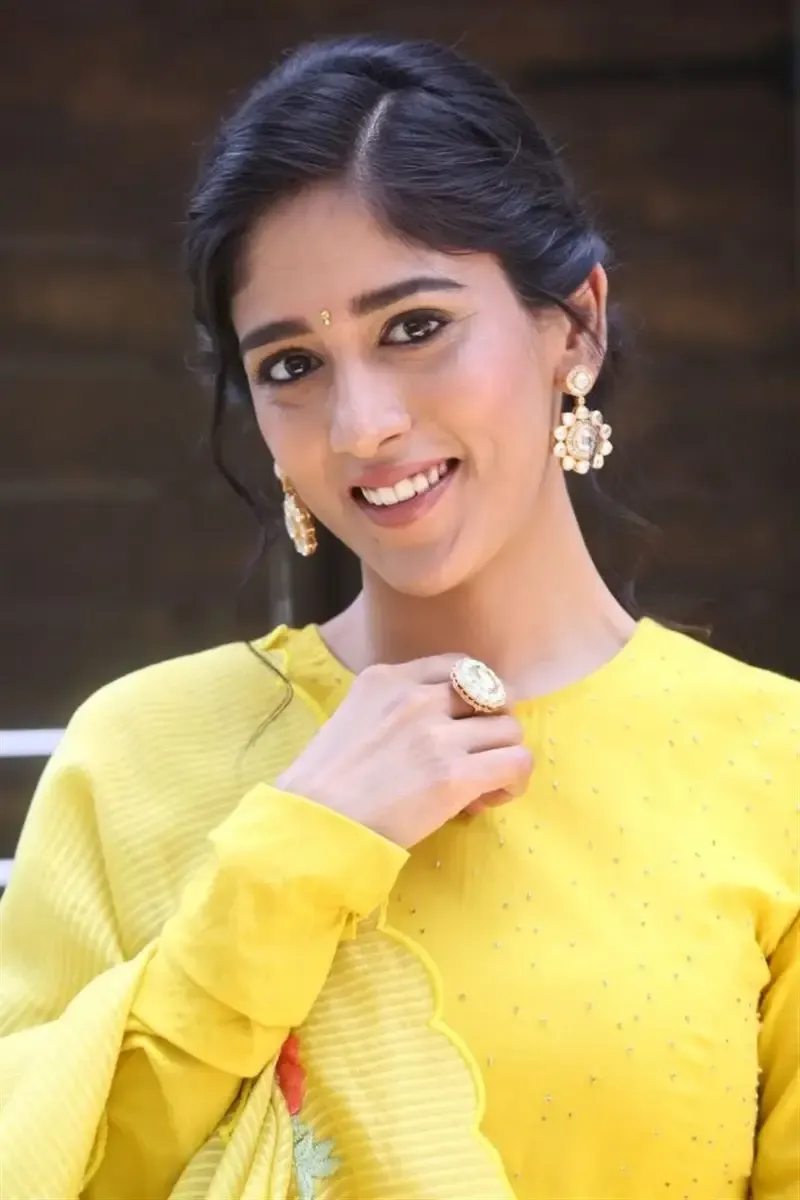 ACTRESS CHANDINI CHOWDARY IN YELLOW DRESS AT MOVIE TEASER LAUNCH 7